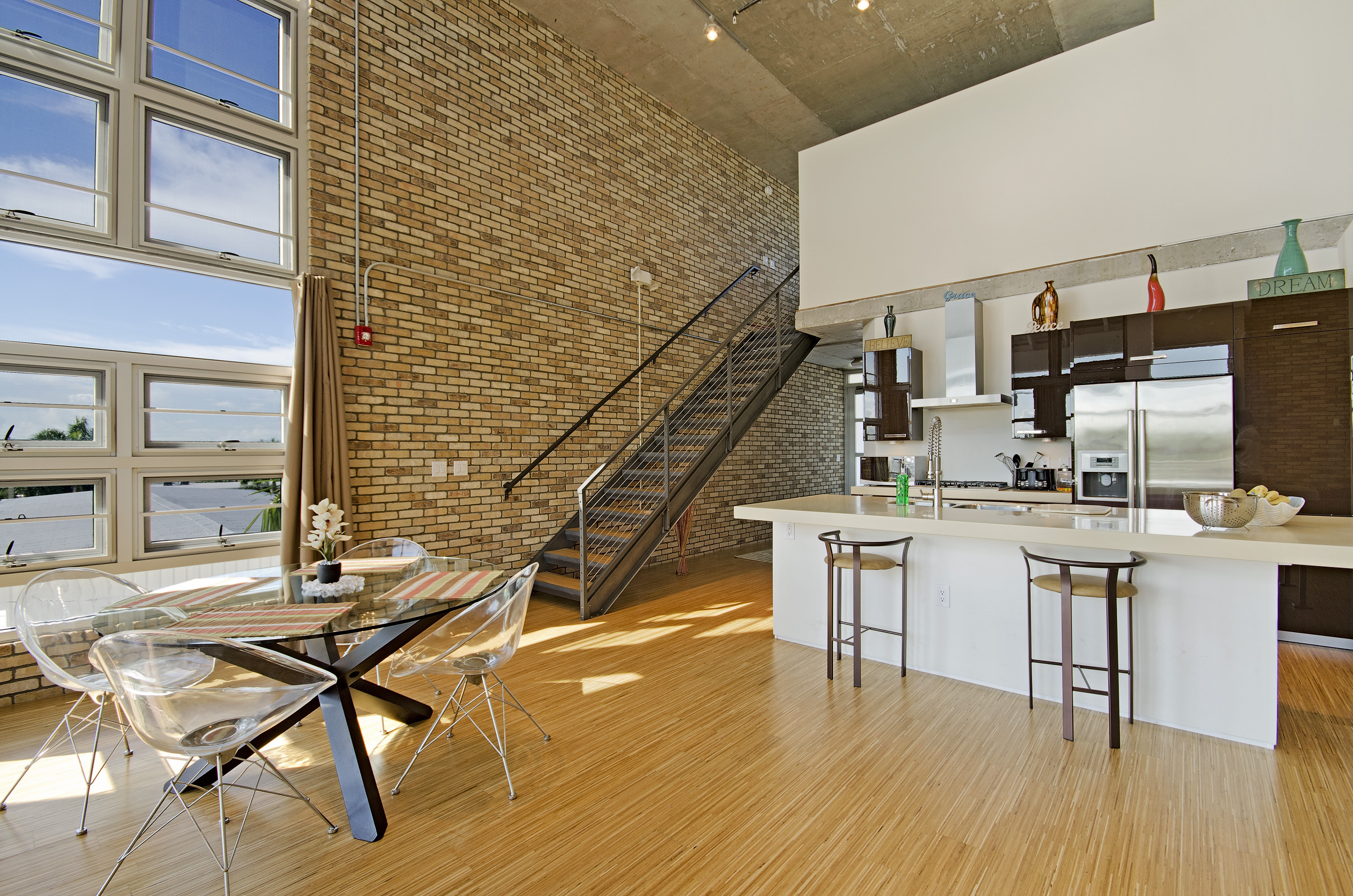 A kitchen view inside a loft from a Naples condominium