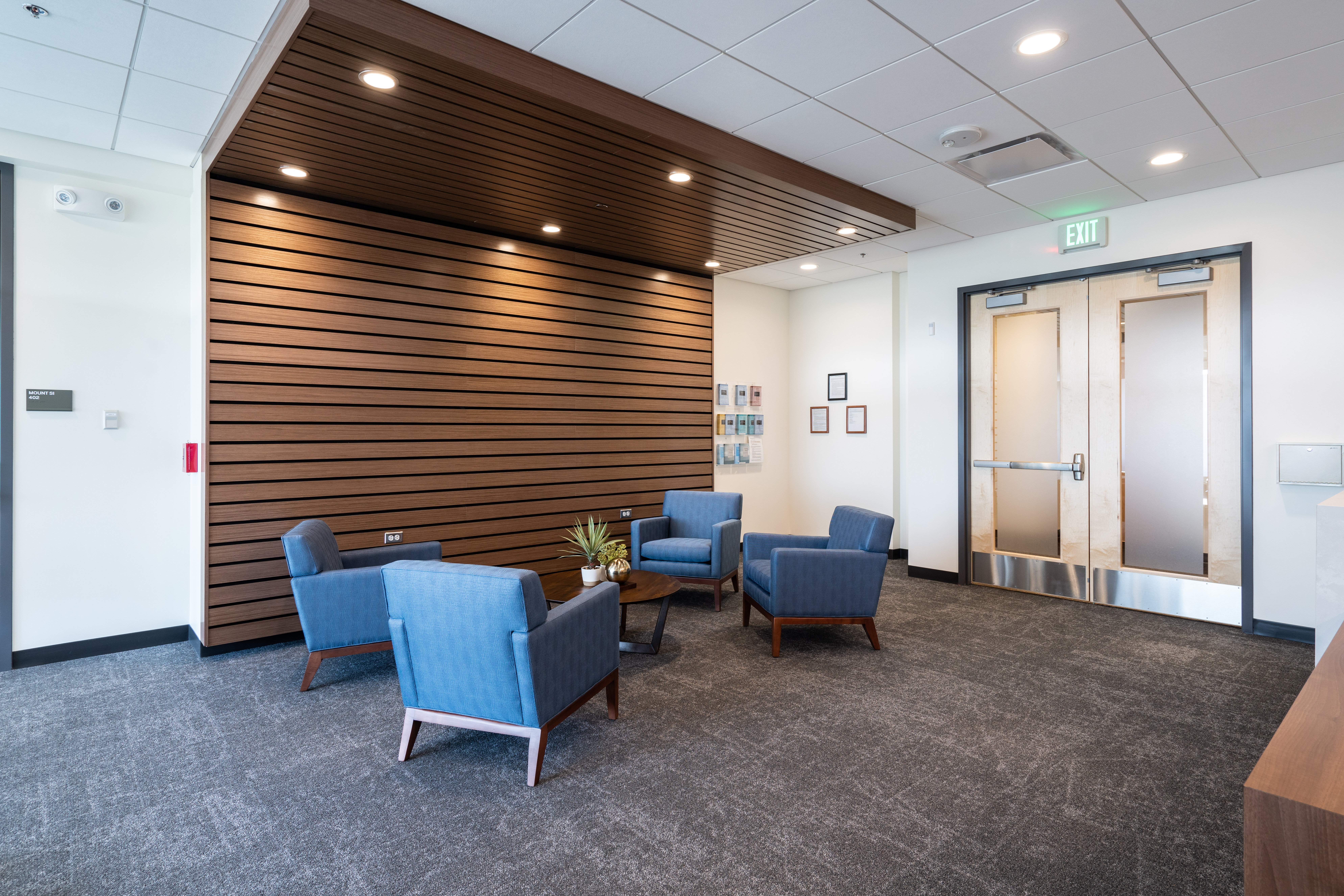 The Hazelden Betty Ford lobby in Bellevue Washington furnished with comfortable blue chairs
